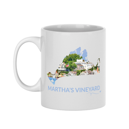 11 oz Edgartown Harbor mug featuring a hand-drawn Martha's Vineyard outline filled with a real photograph of waterfront homes, harbor boats, trees and an American flag, with Martha's Vineyard lettering and airplane swirl