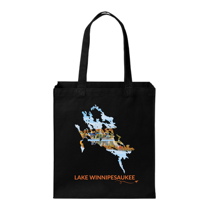 Black canvas tote with Lake Winnipesaukee outline featuring a fall waterfront scene in Meredith, NH, orange Lake Winnipesaukee lettering, and small airplane with swirl