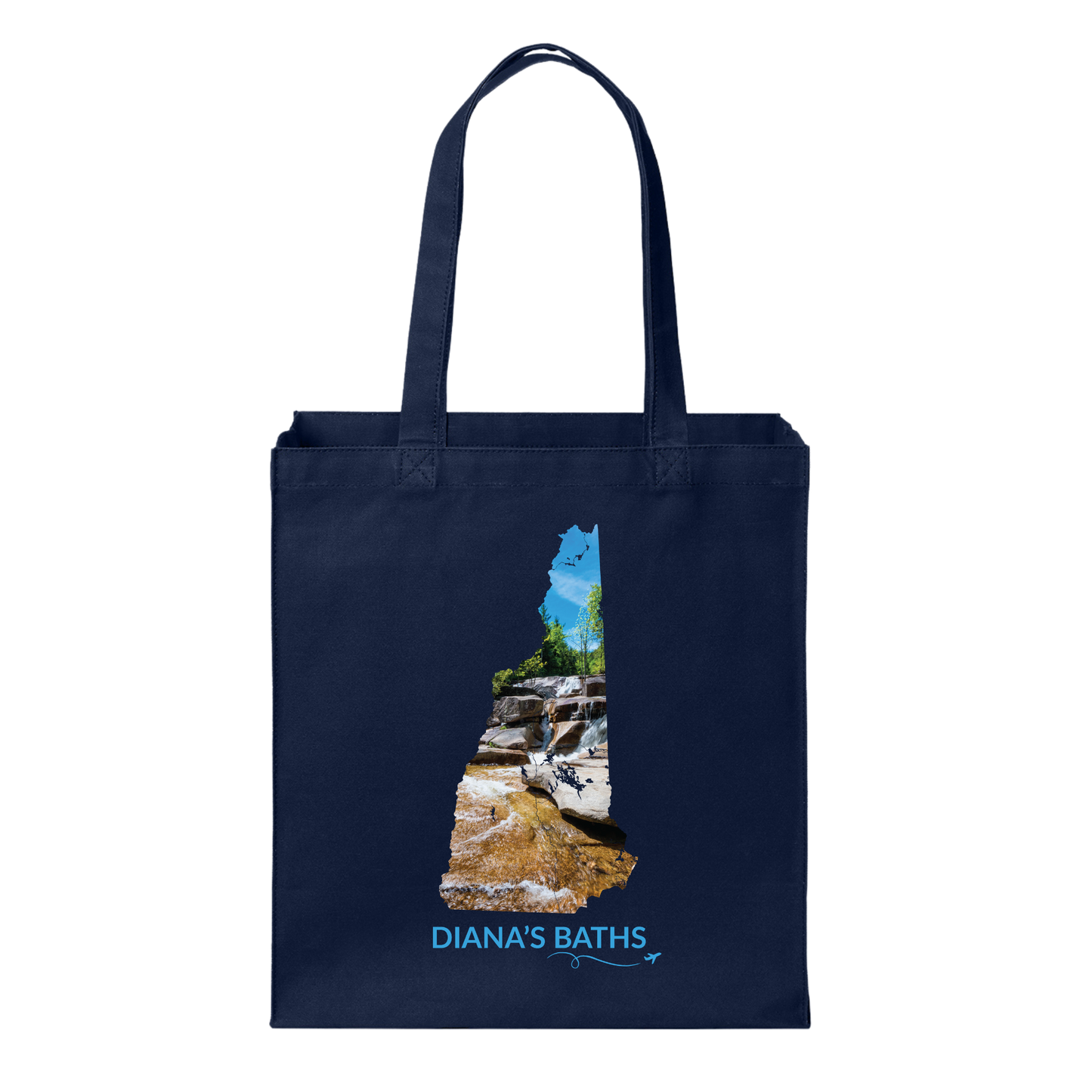 Navy canvas tote bag featuring a hand-drawn New Hampshire outline filled with a photograph of the waterfalls and granite ledges at Diana’s Baths. The words “Diana’s Baths” appear below the artwork with a small airplane icon and looping flight path.
