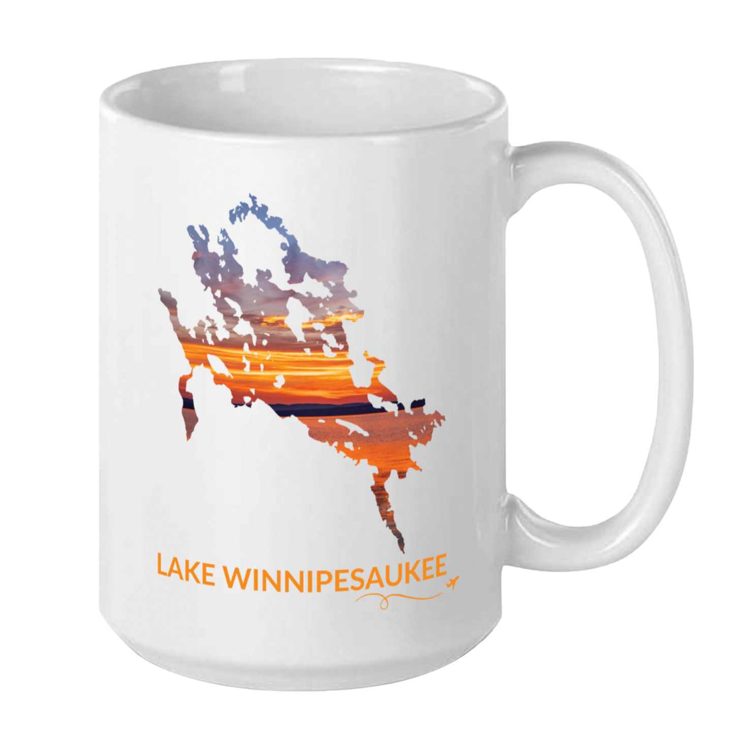 White 15 oz ceramic mug featuring a hand-drawn outline of Lake Winnipesaukee filled with a photograph of a colorful sunset captured on the lake. The words “Lake Winnipesaukee” appear below the artwork with a small airplane icon and looping flight path.