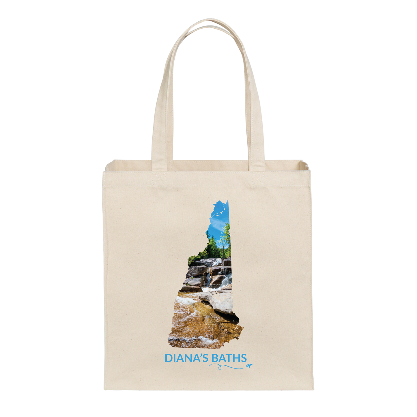 Natural canvas tote bag featuring a hand-drawn New Hampshire outline filled with a photograph of the waterfalls and granite ledges at Diana’s Baths. The words “Diana’s Baths” appear below the artwork with a small airplane icon and looping flight path.