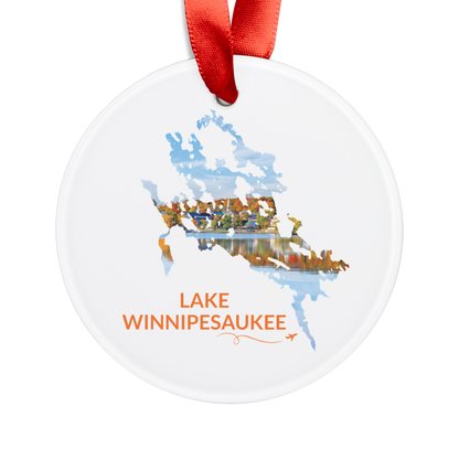 White Lake Winnipesaukee ornament with red ribbon, featuring Meredith waterfront and fall foliage inside the lake outline, orange Lake Winnipesaukee lettering, and a small airplane with swirl