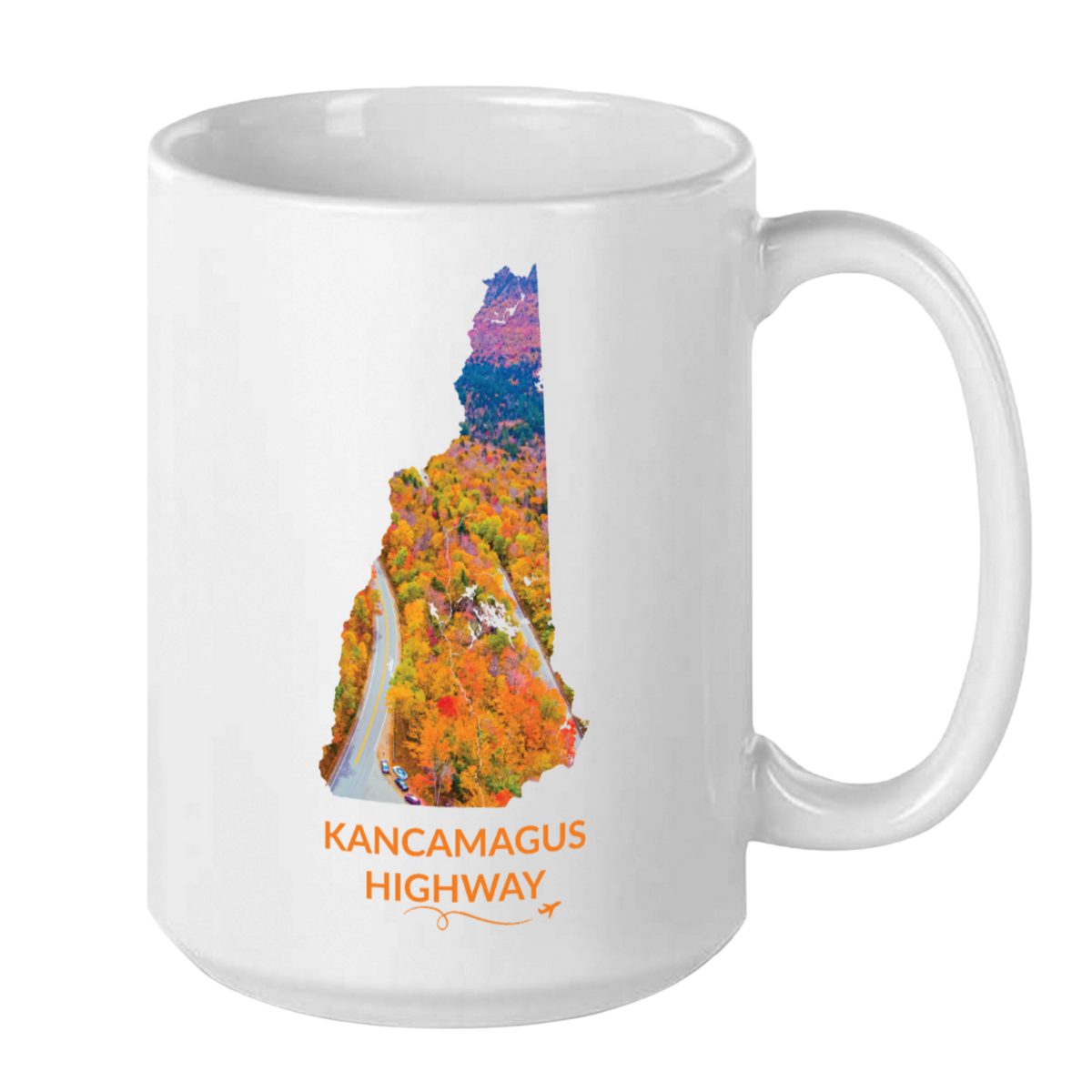 White 15 oz ceramic mug featuring a hand-drawn New Hampshire outline filled with a photograph of the Kancamagus Highway surrounded by colorful autumn foliage. The words "Kancamagus Highway" appear below the artwork with a small airplane icon and looping flight path.