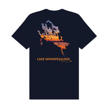 Back of a navy Lake Winnipesaukee t-shirt featuring a hand-drawn outline of the lake filled with a sunset photograph captured on Lake Winnipesaukee. The words “Lake Winnipesaukee” appear below the artwork with a small airplane icon and looping flight path.