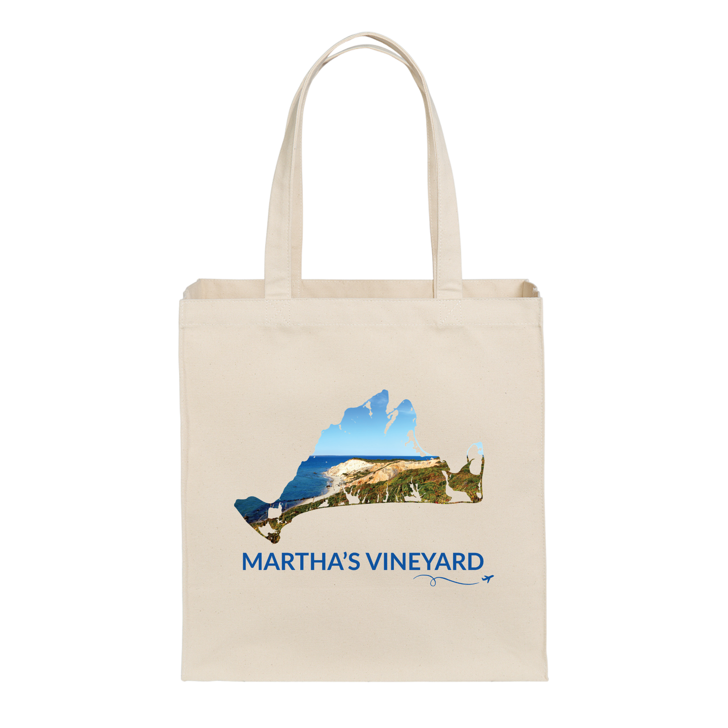 Natural cotton canvas tote bag featuring a hand-drawn Martha's Vineyard outline filled with the Aquinnah Cliffs and ocean. The words "Martha's Vineyard" appear below the artwork with a small airplane icon and looping flight path.