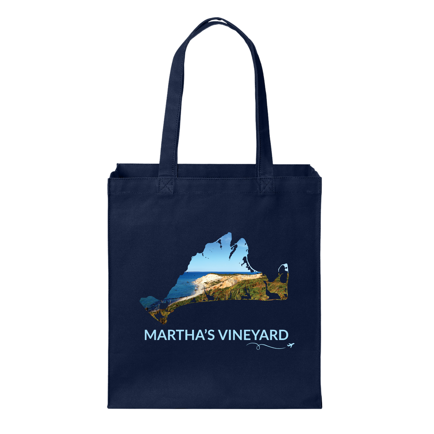 Navy cotton canvas tote bag featuring a hand-drawn Martha's Vineyard outline with the Aquinnah Cliffs and Atlantic Ocean inside the outline. The words "Martha's Vineyard" appear below the artwork with a small airplane icon and looping flight path.