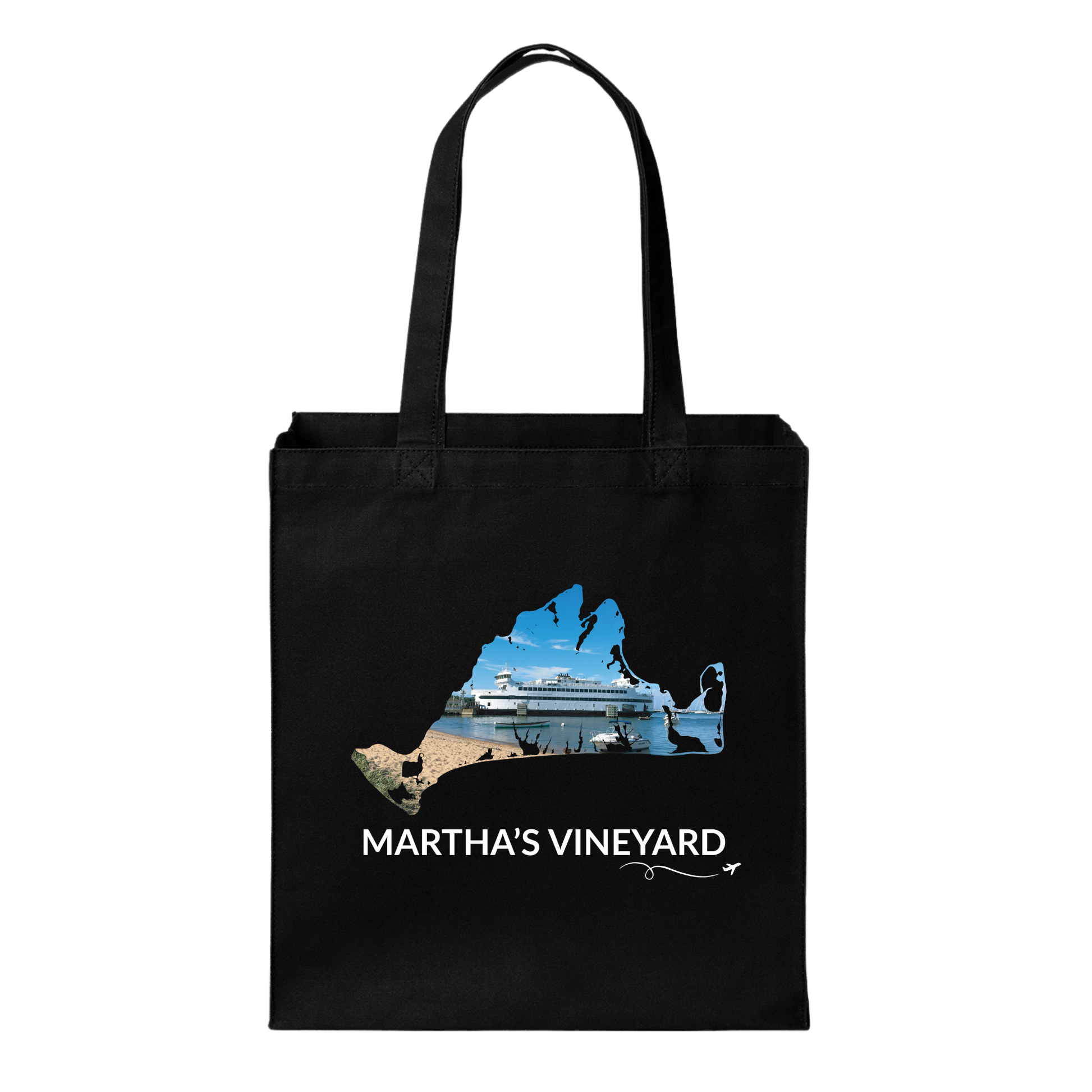 Black cotton canvas tote bag featuring a hand-drawn Martha's Vineyard outline filled with the Steamship Authority ferry docked in Vineyard Haven with the harbor, beach, and water. The words "Martha's Vineyard" appear below the artwork with a small airplane icon and looping flight path.
