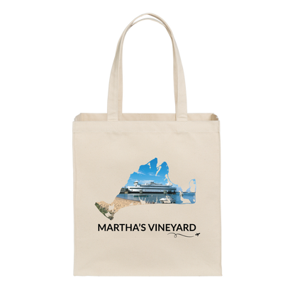 Natural cotton canvas tote bag featuring a hand-drawn Martha's Vineyard outline showcasing the Steamship Authority ferry docked in Vineyard Haven with the harbor and sandy beach. The words "Martha's Vineyard" appear below the artwork with a small airplane icon and looping flight path.
