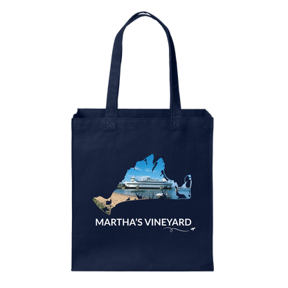 Navy cotton canvas tote bag featuring a hand-drawn Martha's Vineyard outline with the Steamship Authority ferry, Vineyard Haven harbor, and shoreline. The words "Martha's Vineyard" appear below the artwork with a small airplane icon and looping flight path.