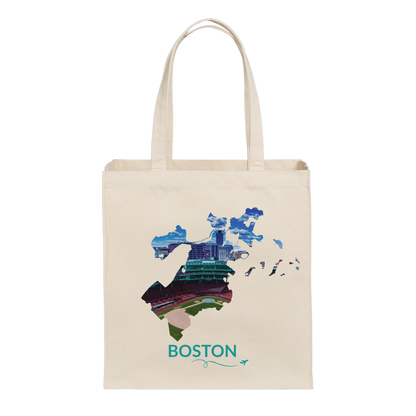 Natural cotton canvas tote bag featuring a hand-drawn Boston outline filled with an aerial view of Fenway Park. The word "Boston" appears below the artwork with a small airplane icon and looping flight path.