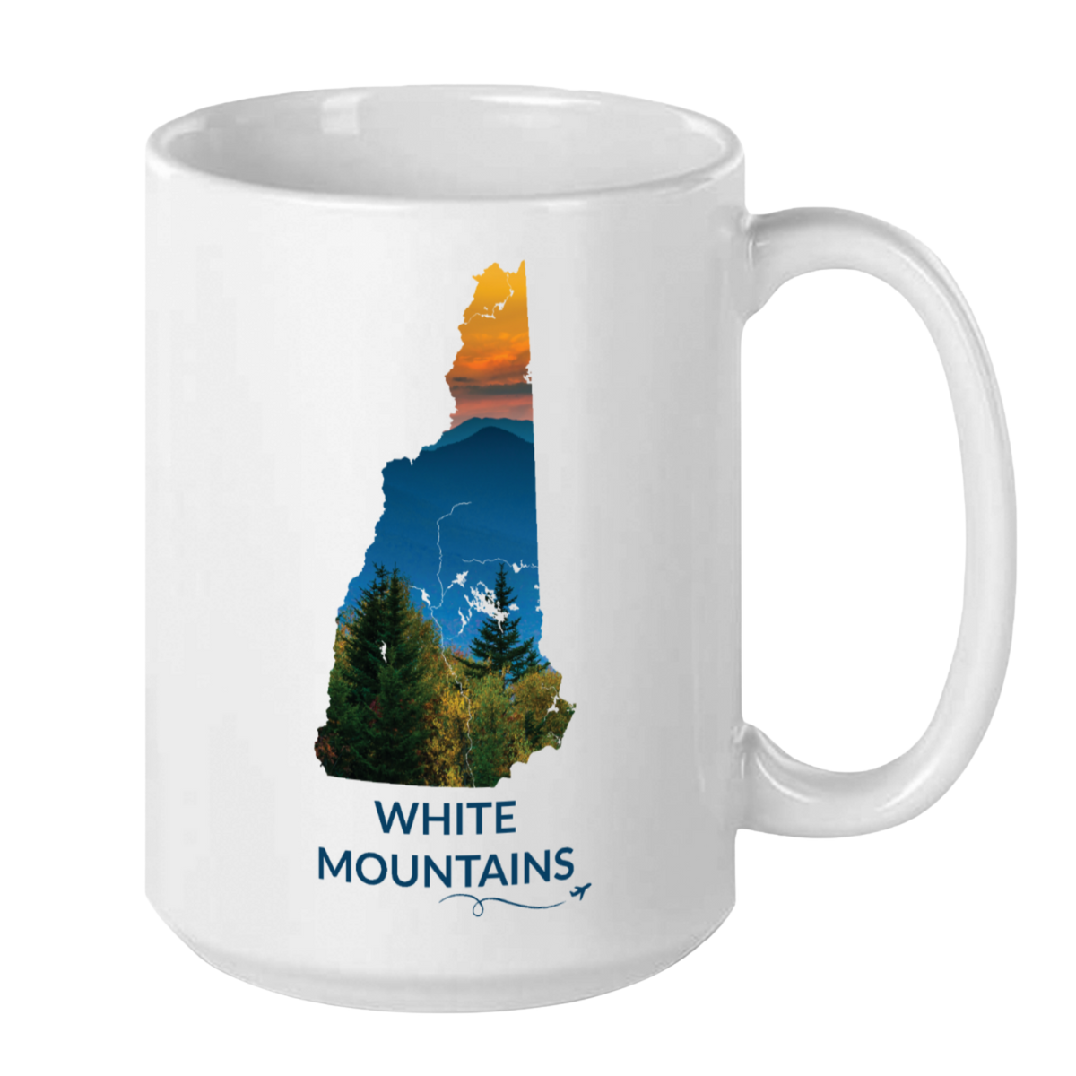 White 15 oz ceramic mug featuring a hand-drawn New Hampshire outline filled with a photograph of the White Mountains at sunset. The words "White Mountains" appear below the artwork with a small airplane icon and looping flight path.